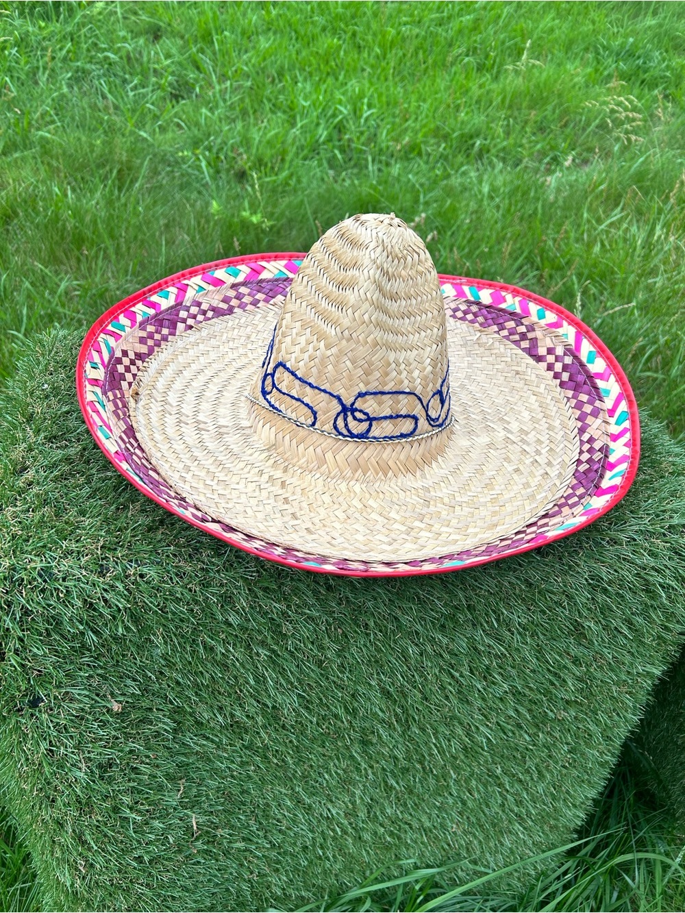 woven straw Mexican sombrero, 
18 to 19 inches in width with a 7-inch tall